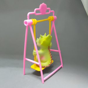 DINOSAUR IN SWING