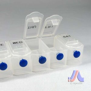 PUSH BUTTON PILL ORGANIZER